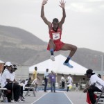 Andwuelle Wright competes in the Boys under-20 long jump, where he grabbed gold with his first effort, a 7.44-metre leap.