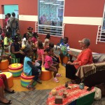 Thelma Perkins Speaking to Children in the Storytelling Room of the SLF.