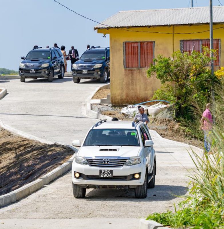 Vehicles and patrons at the turntable of the recently commissioned concrete road, King Peter’s Bay Hill.